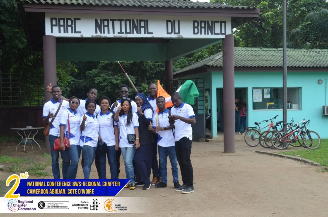 Chapter members at Parc National du Banco, Abidjan, holding the Ivorian flag
